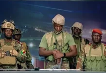 SHOCKING: Benin Plunges Into Chaos as Armed Soldiers Seize State TV, Declare President Talon OustedÂ